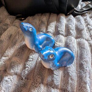 Ceramic salt and pepper shakers in the form of blue seals